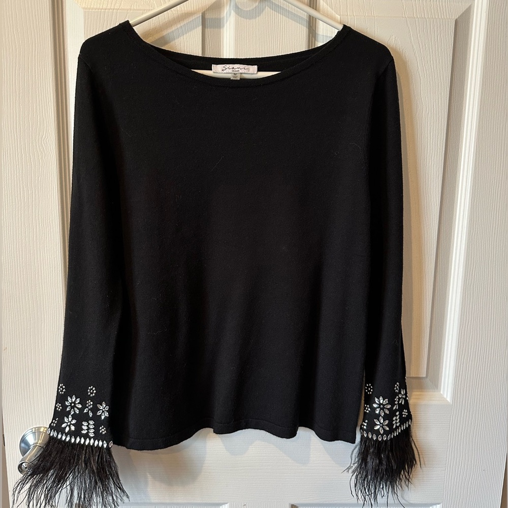 Sioni Black Top with Feather Cuffs and Floral Accents